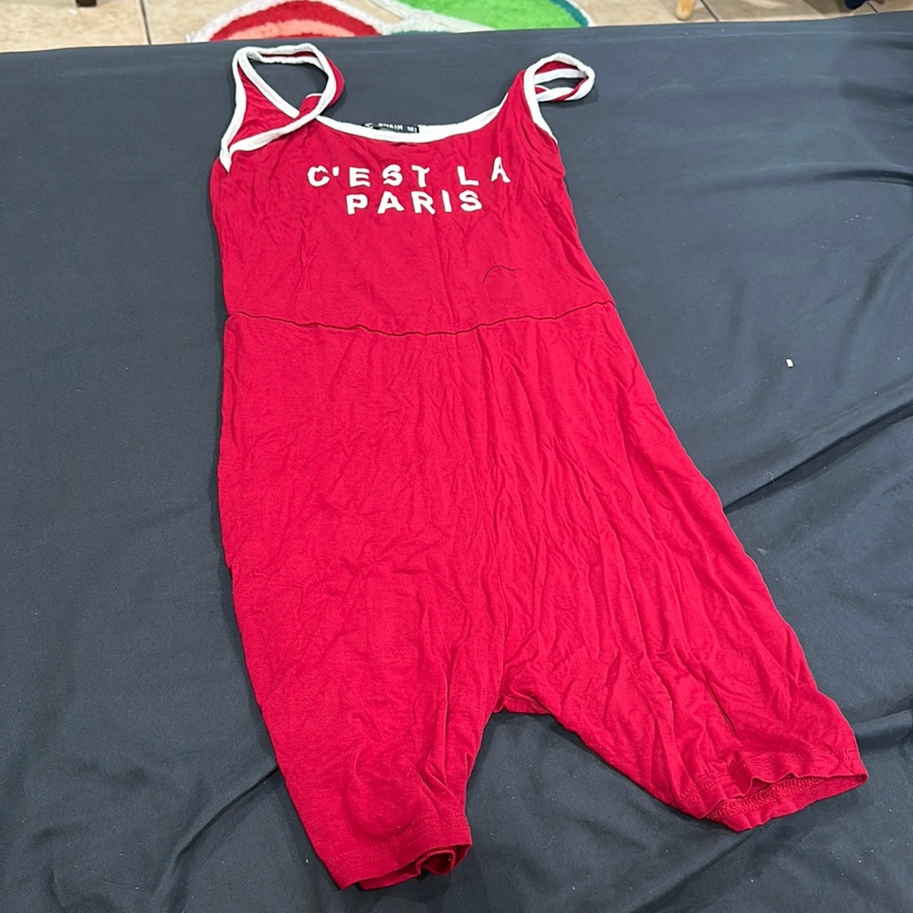 red jumpsuit